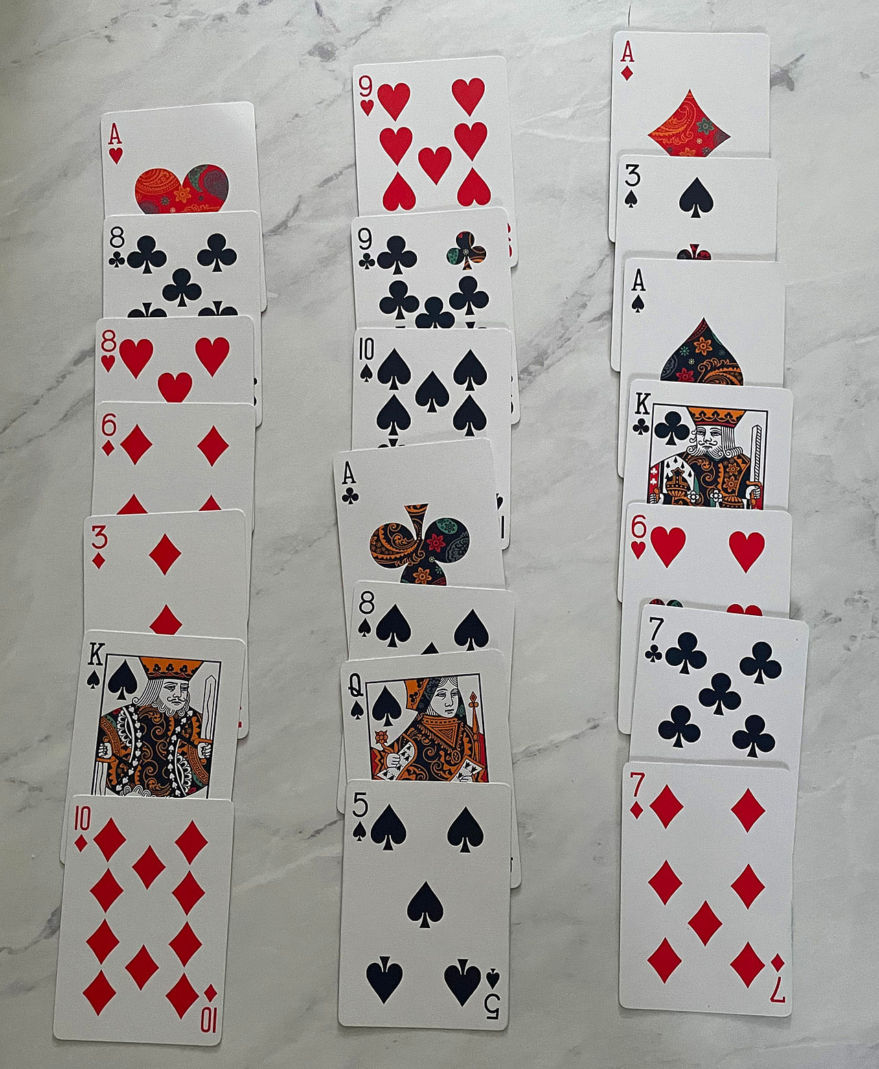 Playing cards arranged in columns for the 21 card trick