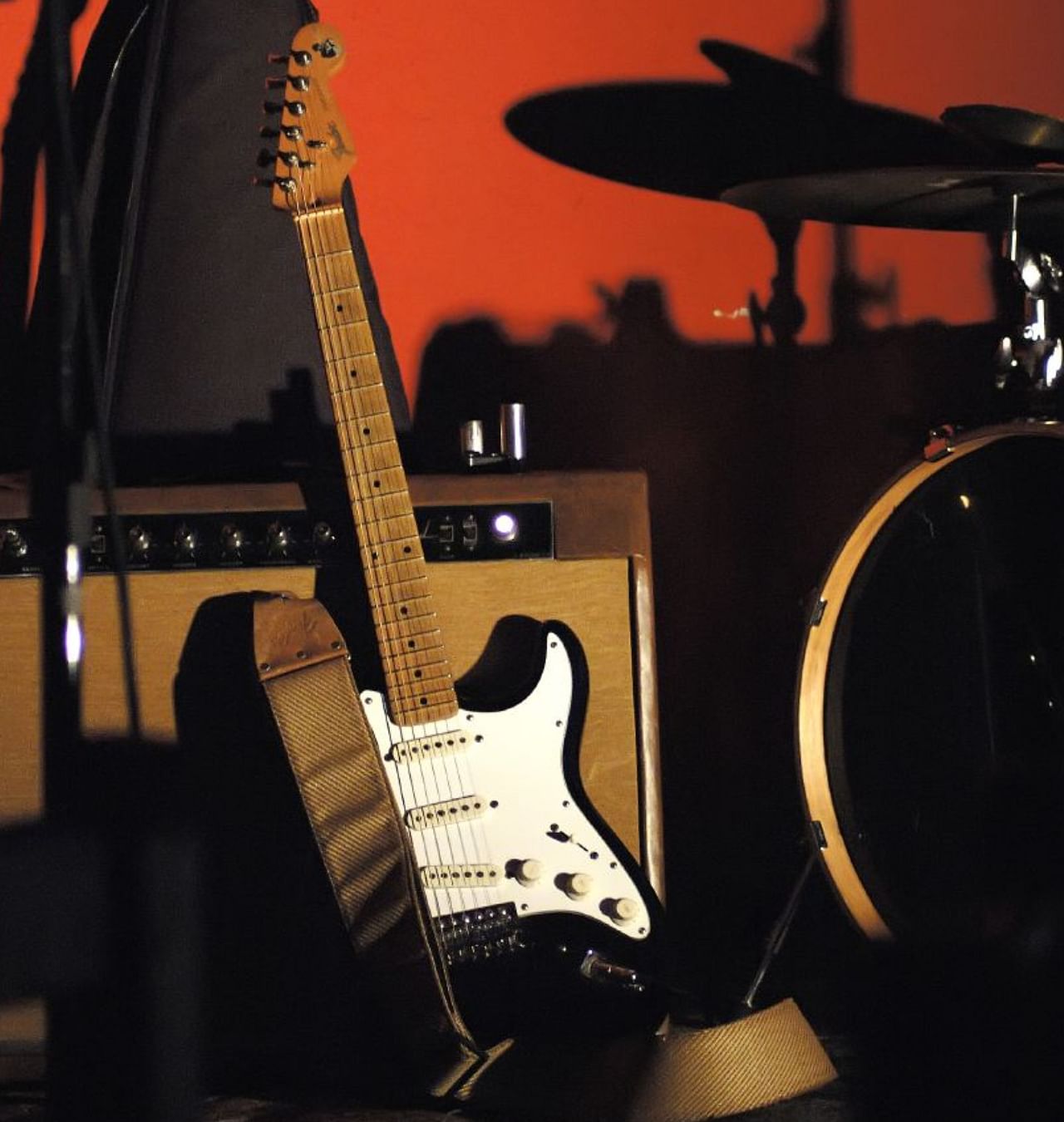 blues guitar resting on amp