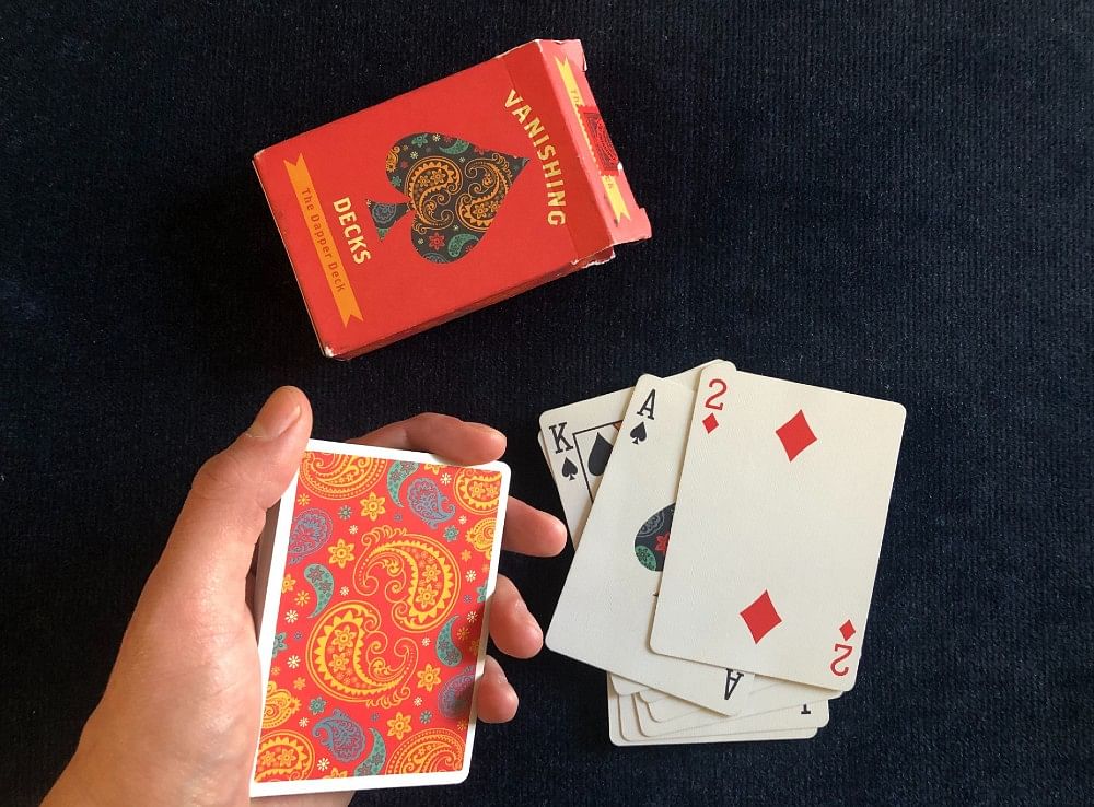 An Ace of Spades and Two of Diamonds from a Vanishing Inc Dapper Deck are used for an easy card trick
