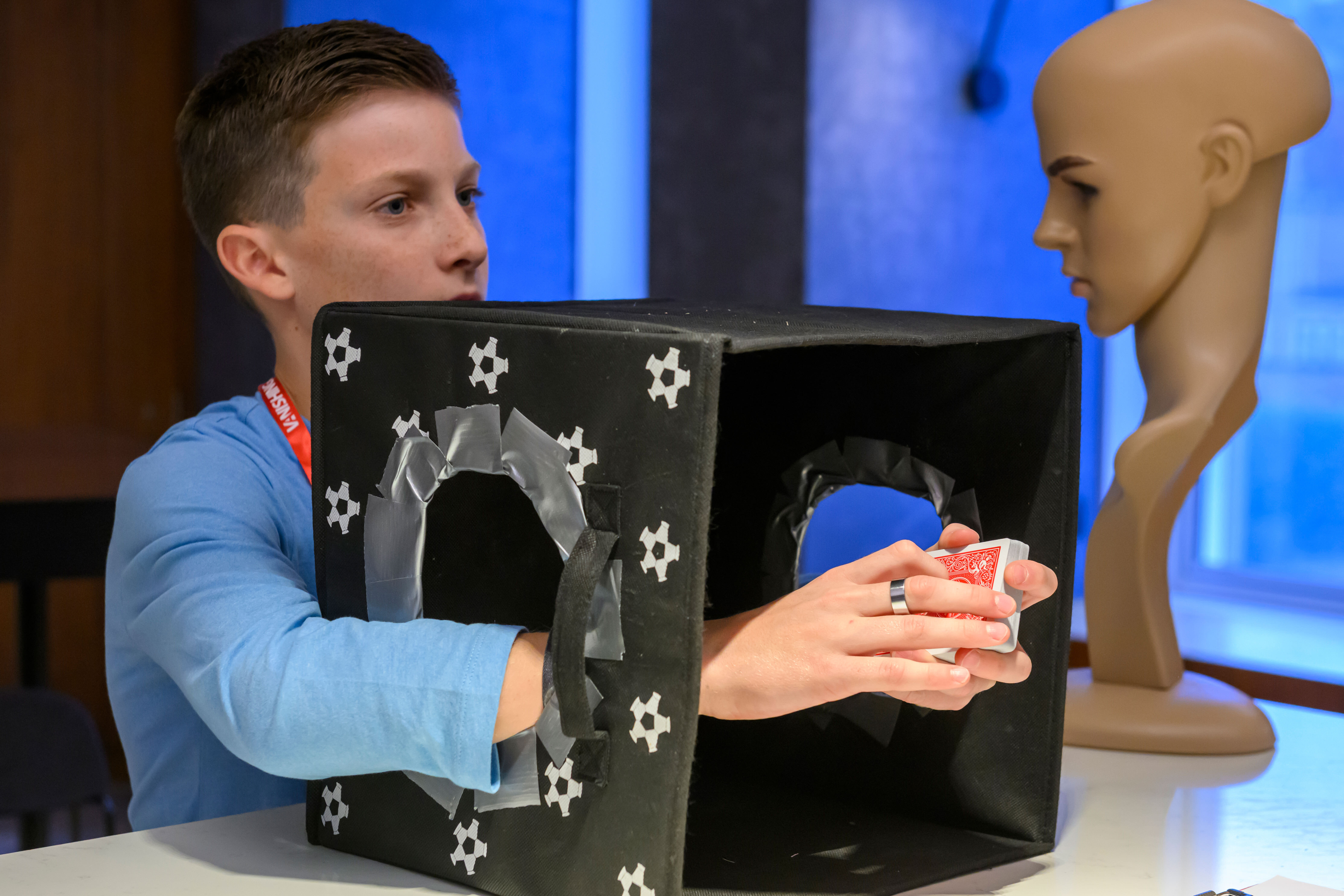 Boy with hands in blind box