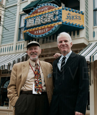 Steve Martin stands in front of disneyland magic shop he worked at