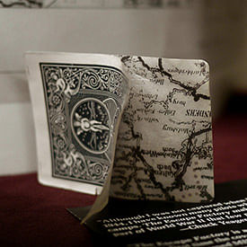 bicycle pow playing cards with map hidden inside