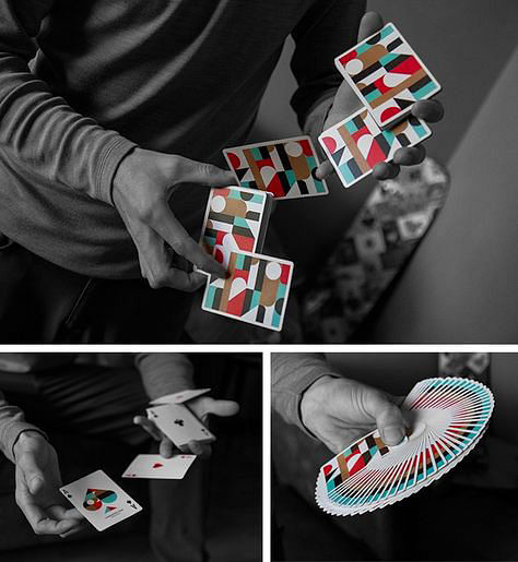 young magician performs cardistry flourishes and spreads