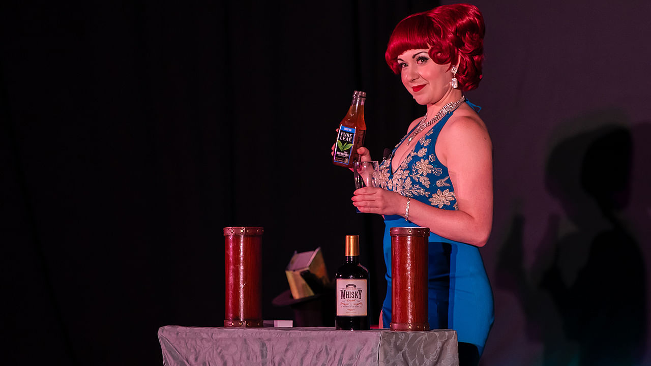 magician carissa hendrix performs magic as lucy darling at magifest magic convention