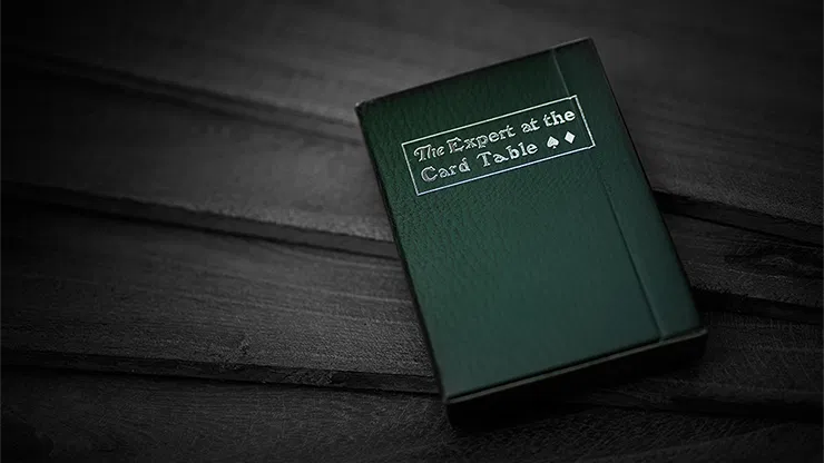 Green Luxury Expert at the Card Table Playing Cards