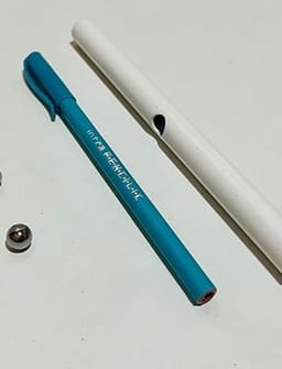 Steel Ball Through Pen Trick